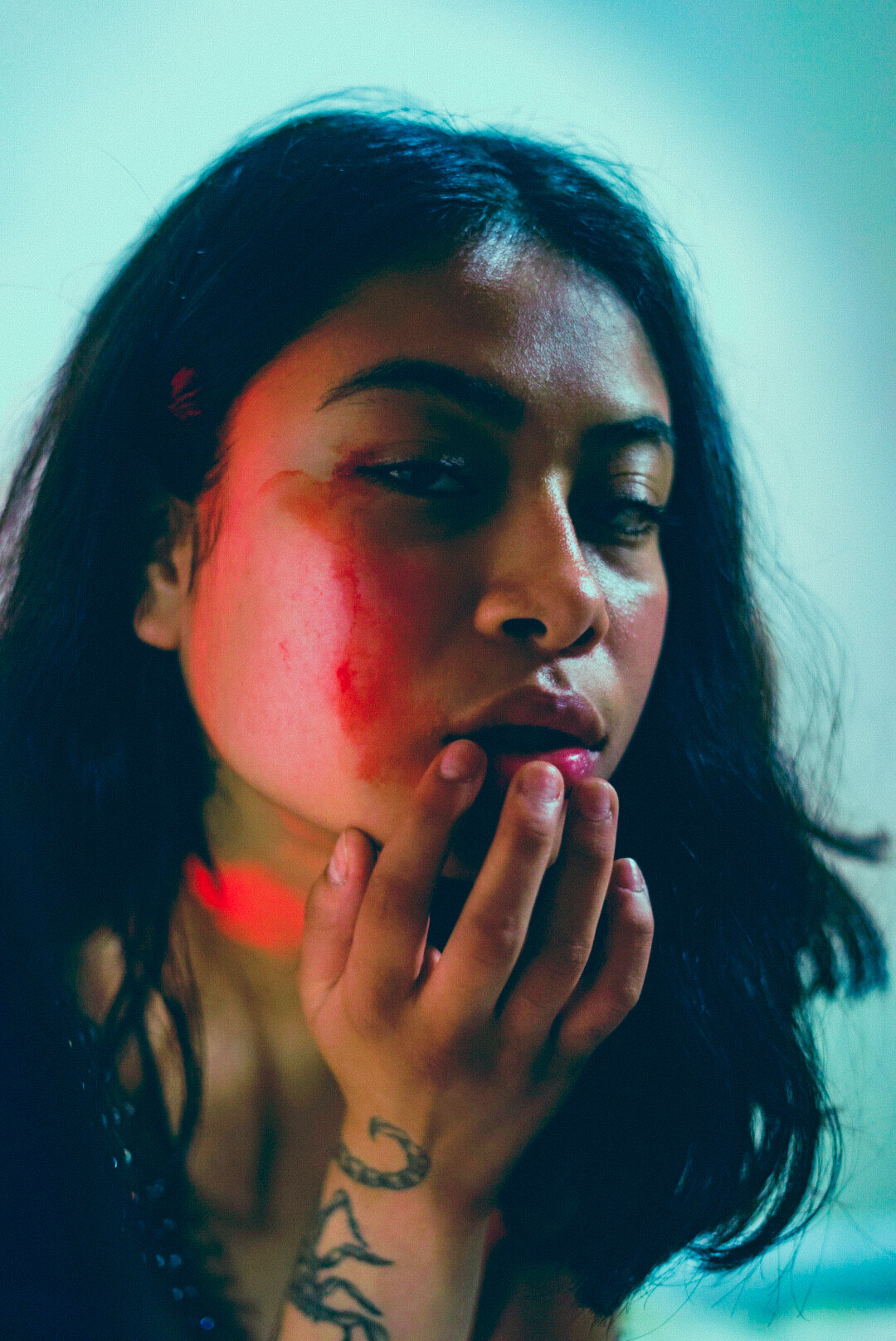 Close beauty portrait under red and blue light